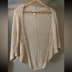 Elegant, cream-colored, sparkly shrug, perfect for New Year’s Eve